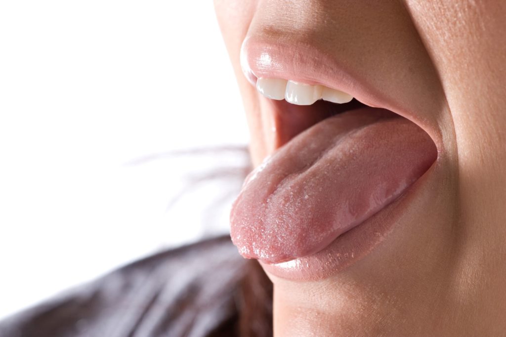 As part of an oral cancer screening, the dentist will examine the top, sides and bottom of your tongue.